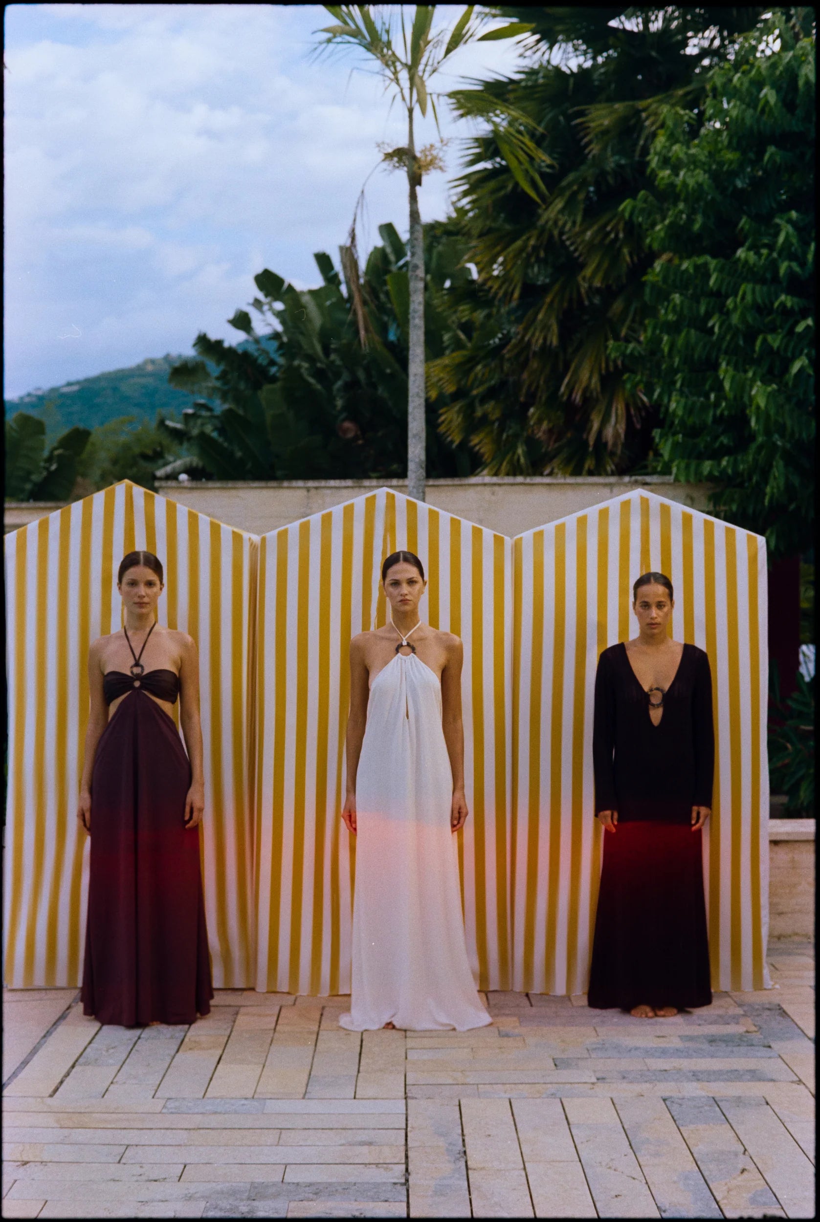 Mocha mane Yvon Dress at group event, Halter silhouette and sophisticated design.