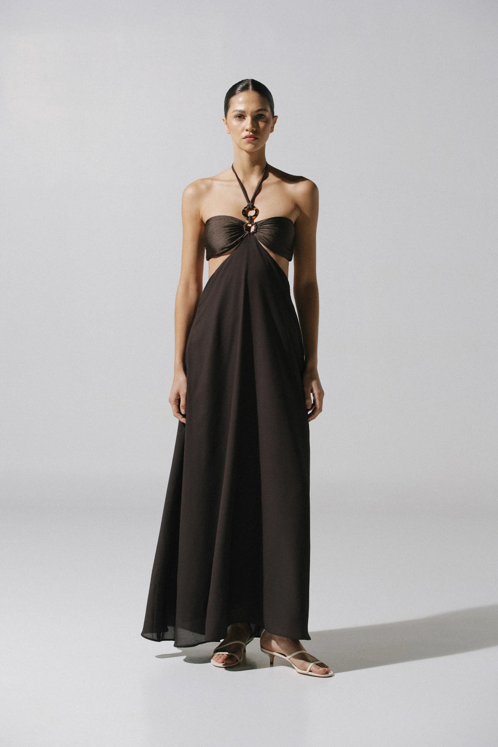 Yvon Maxi Dress by Baobab in mocha mane color, Halter neckline with Front cutouts and Ring detail.