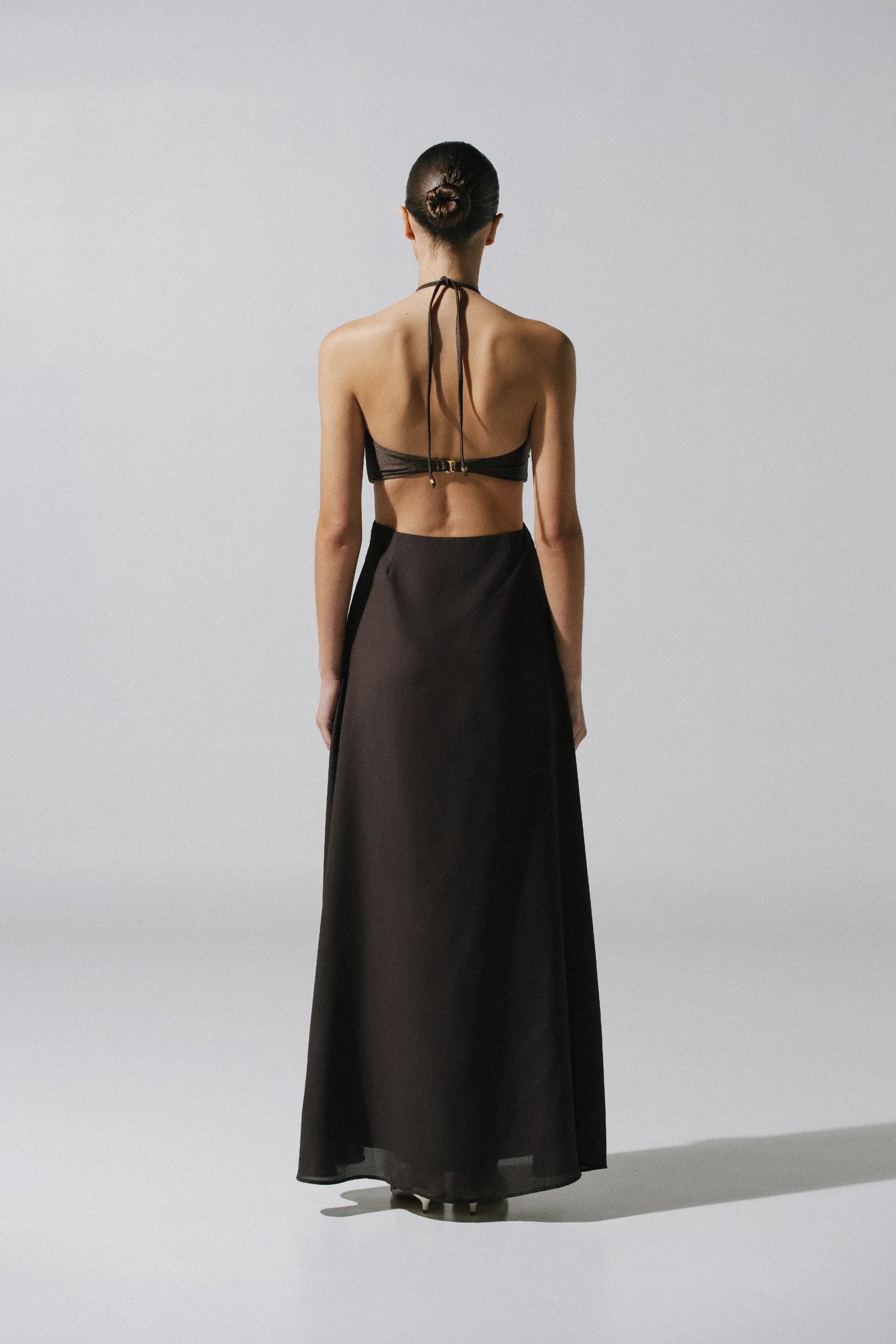 Detail of the Yvon Dress by Baobab, Decorative ring and Ruched neckline.