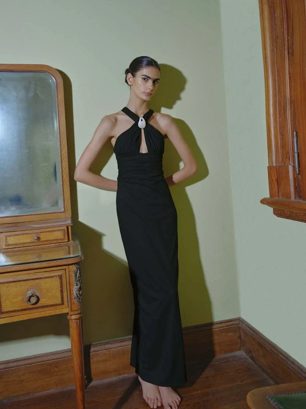 Detail of the Giglio Dress by Baobab, Halter neckline with Baobab hardware and Structured texture.