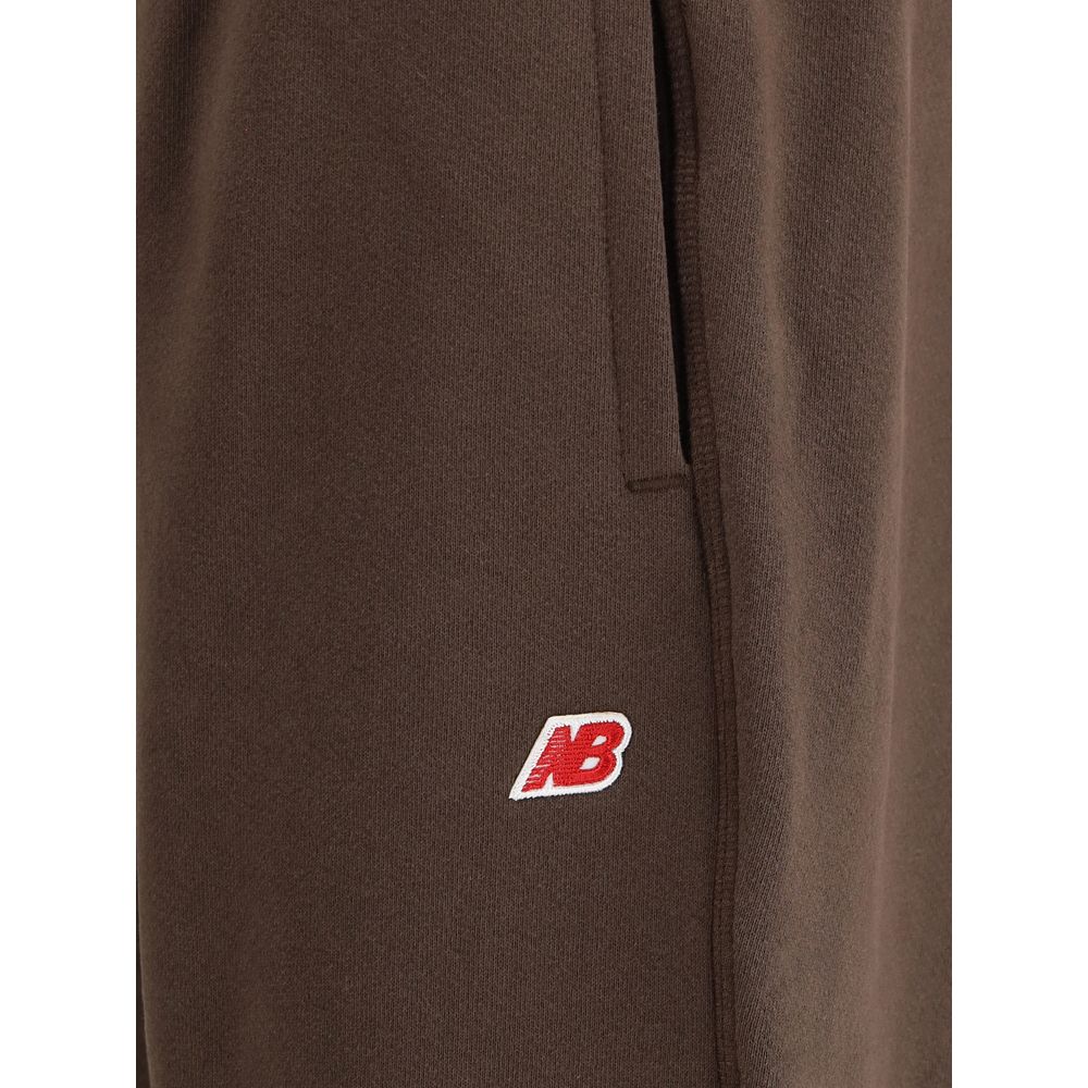 New Balance Elastic-waistband logo-patch track Pants